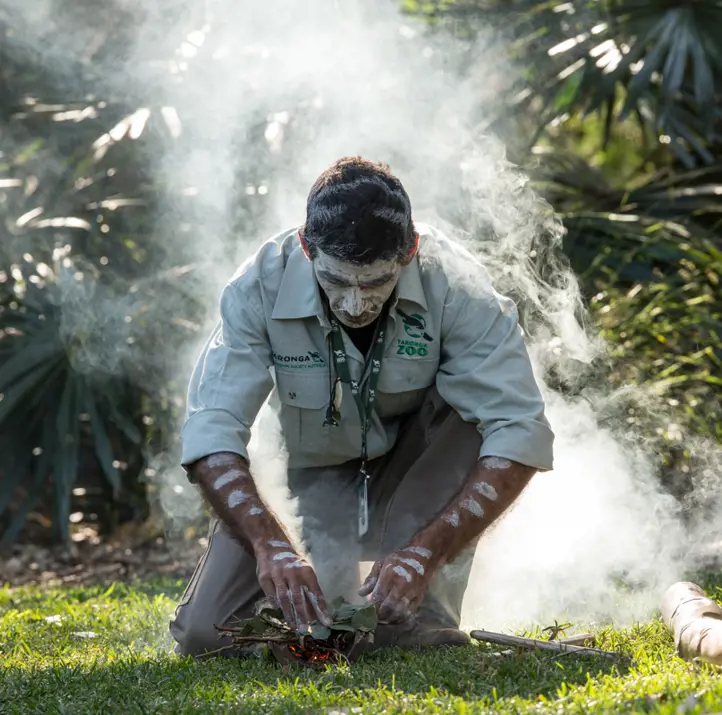 Indigenous Taronga representative with smoke ceremony