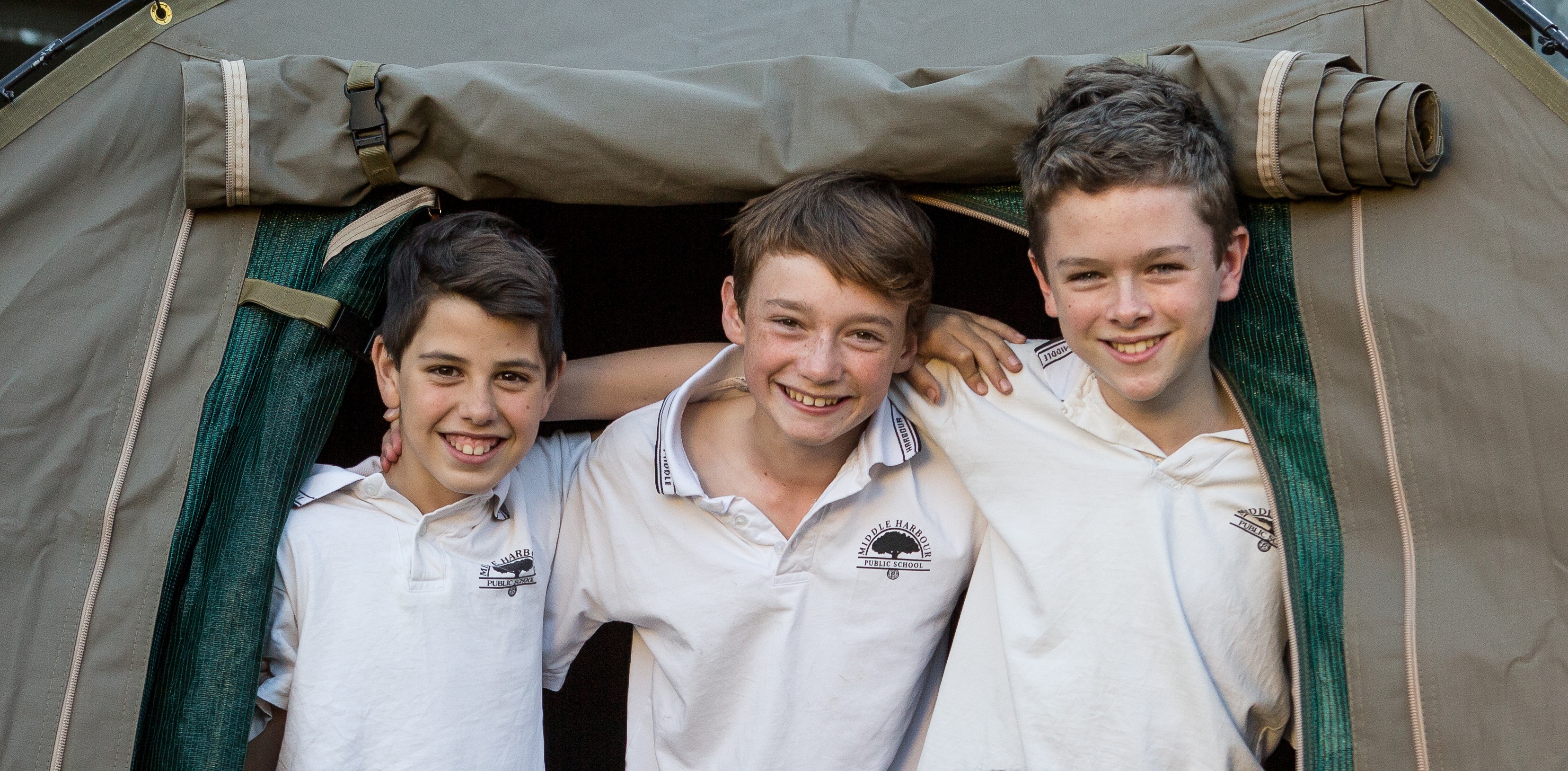 Students inside safari‑style tent accommodation during a Zoosnooz overnight education experience.
