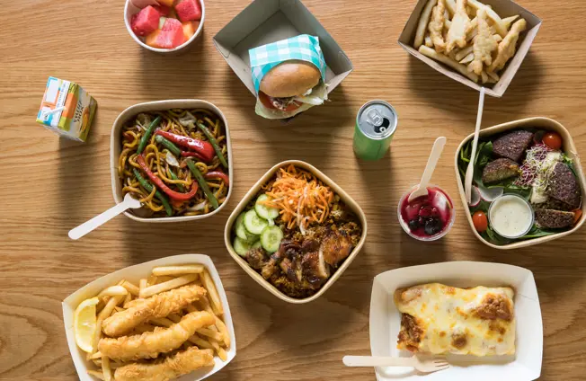 A variety of food options from Taronga Food Market including fish and chips, nasi goreng, nuggets and chips, lasagne, salad, burger and fruit.